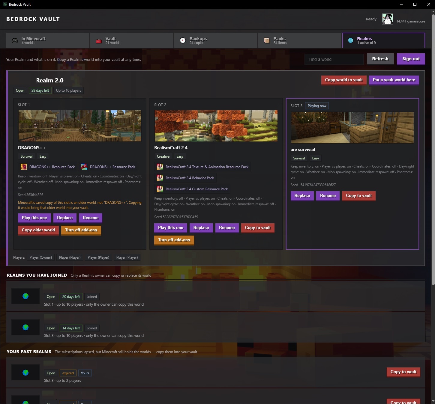 The Realms tab — all three slots side by side with worlds, add-ons, game rules and players