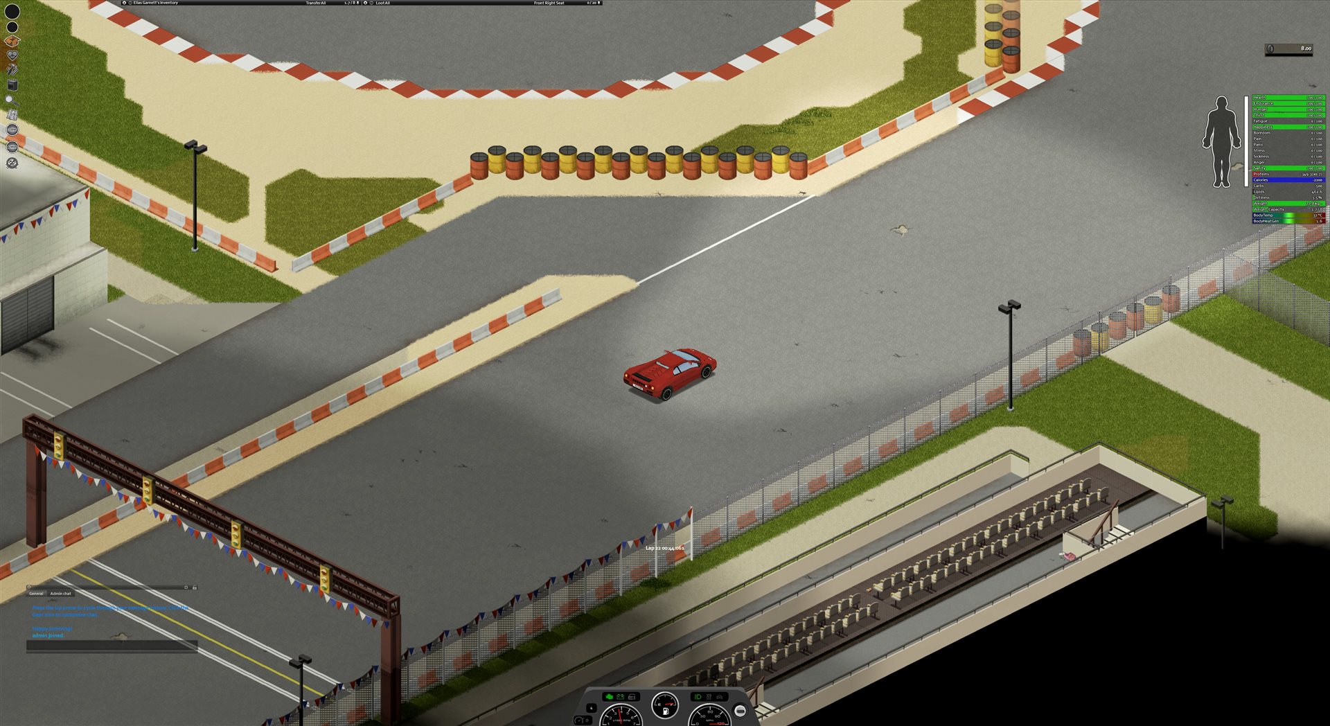 A red sports car crossing the start/finish line of a barrier-lined circuit, lap 22 on the clock